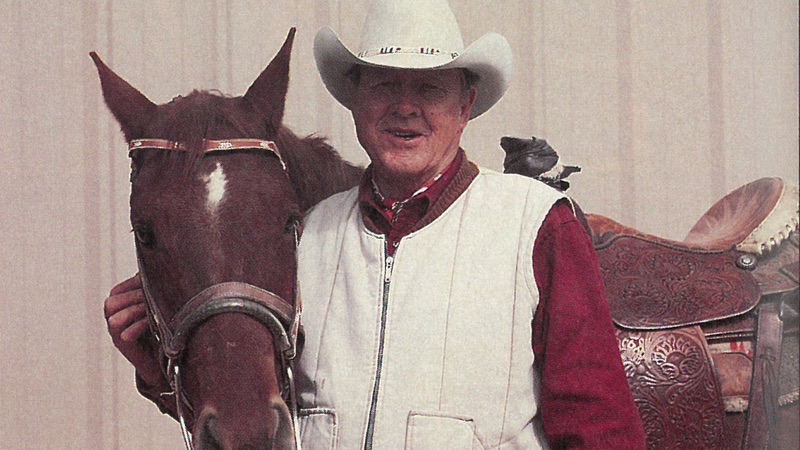 Ben Johnson standing with horse