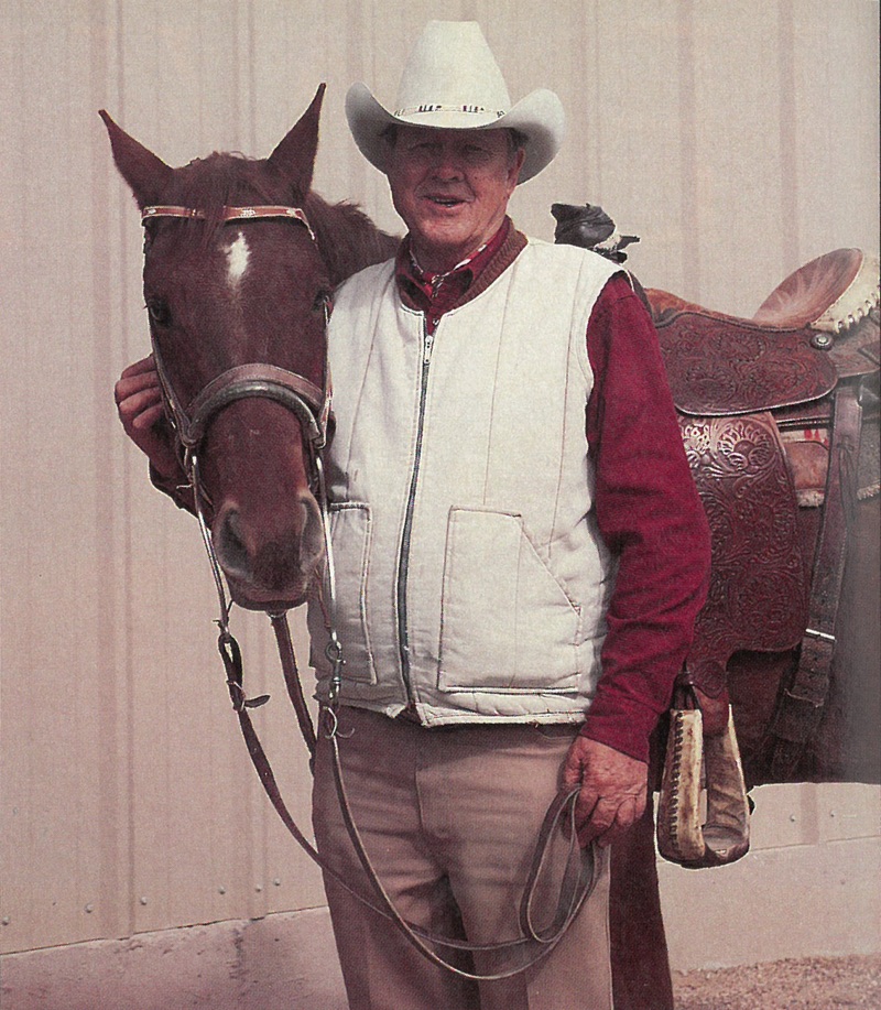 Ben Johnson standing with horse