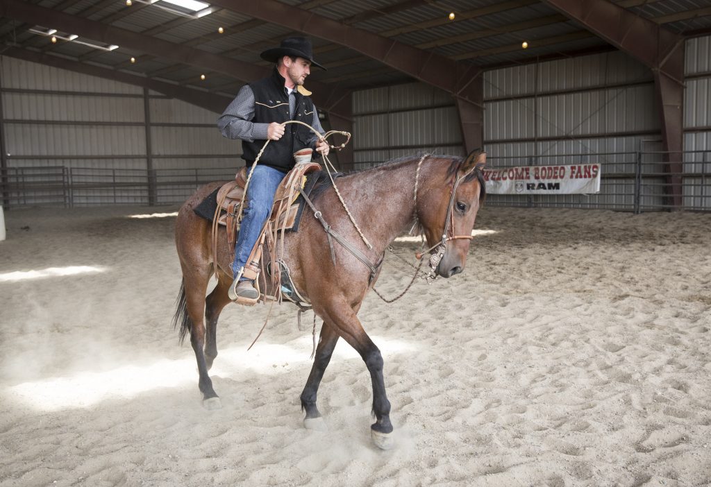 Wade Black rides a horse at Treasure Valley Community College.