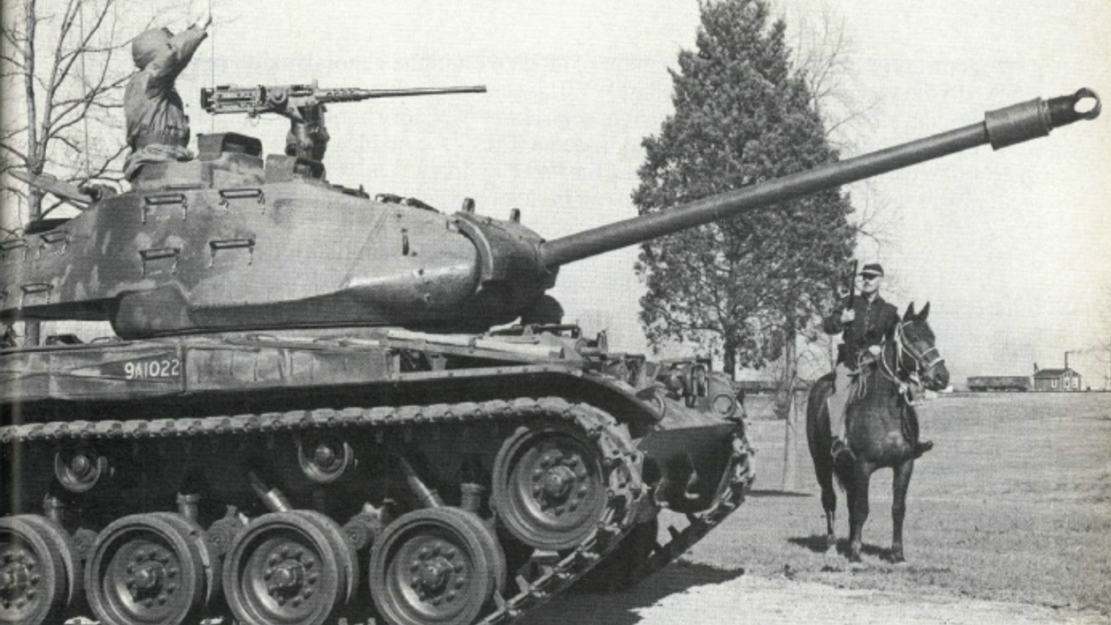 Image taken after World War II of horse and rider and a tank