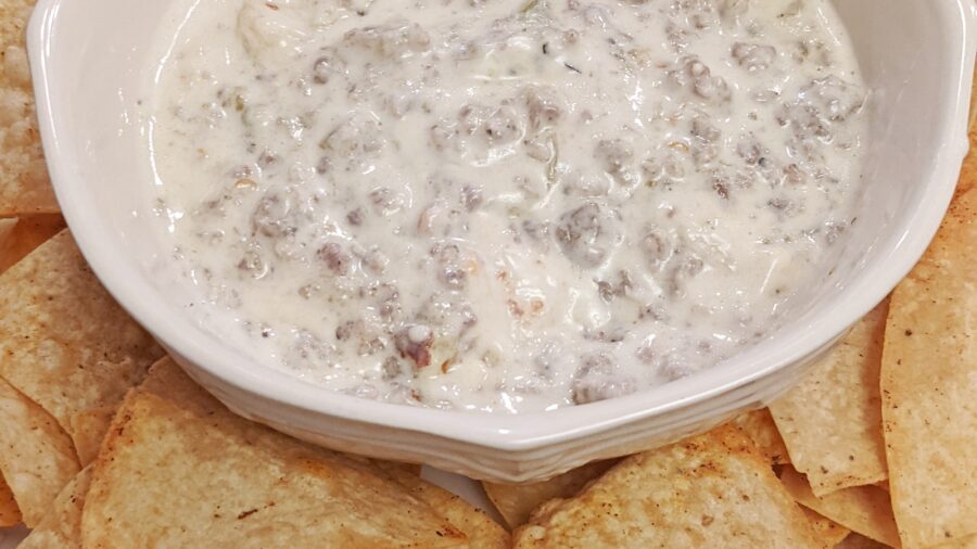 Gary’s Green Chile Queso Blanco served with tortilla chips.